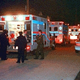 Emergency personnel load one of Banks' victims into an ambulance.